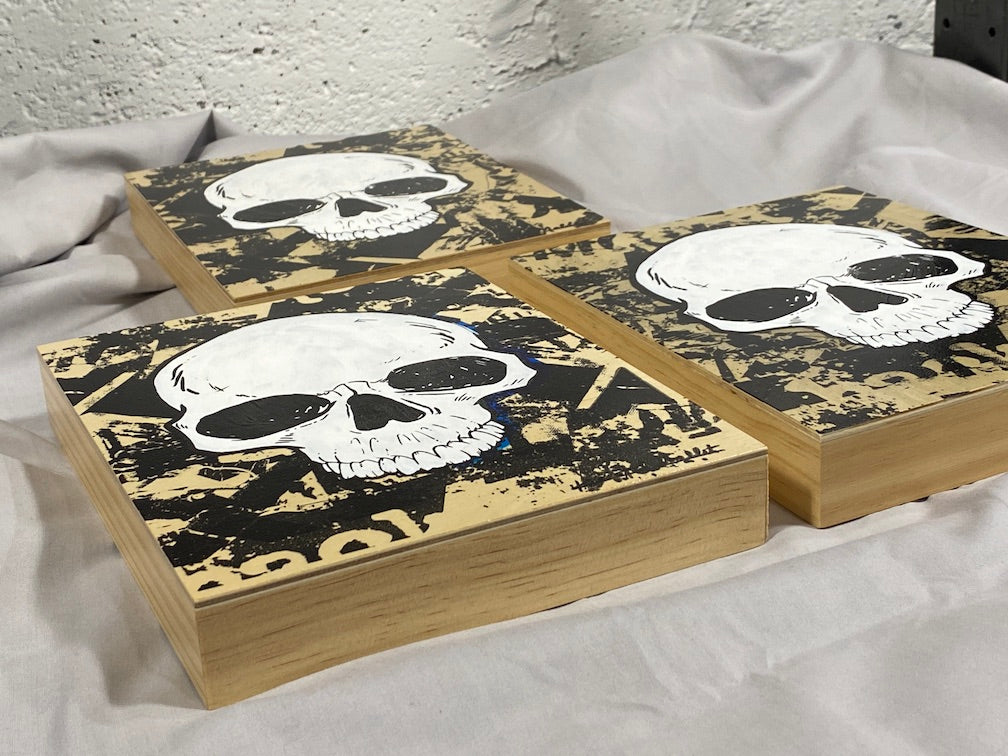 Memento Mori Skulls on Wood